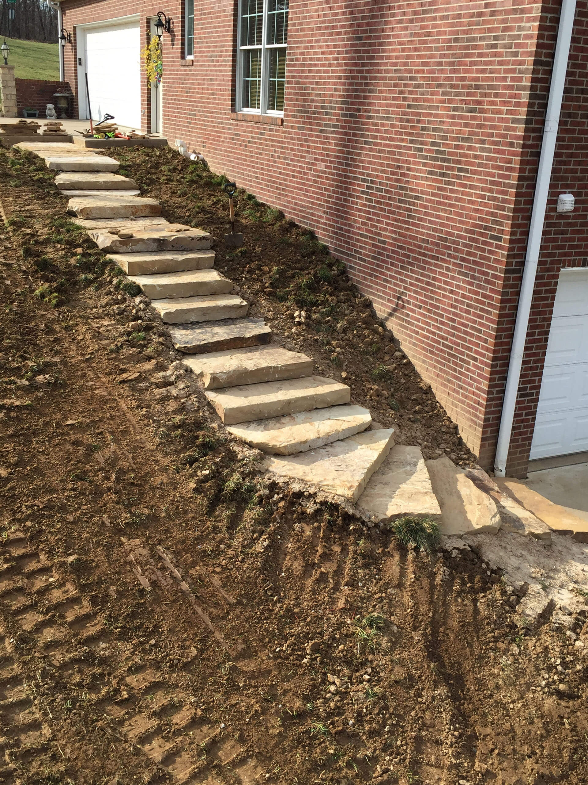 natural stone steps are part of this landscaping project Cape Girardeau, MO Project