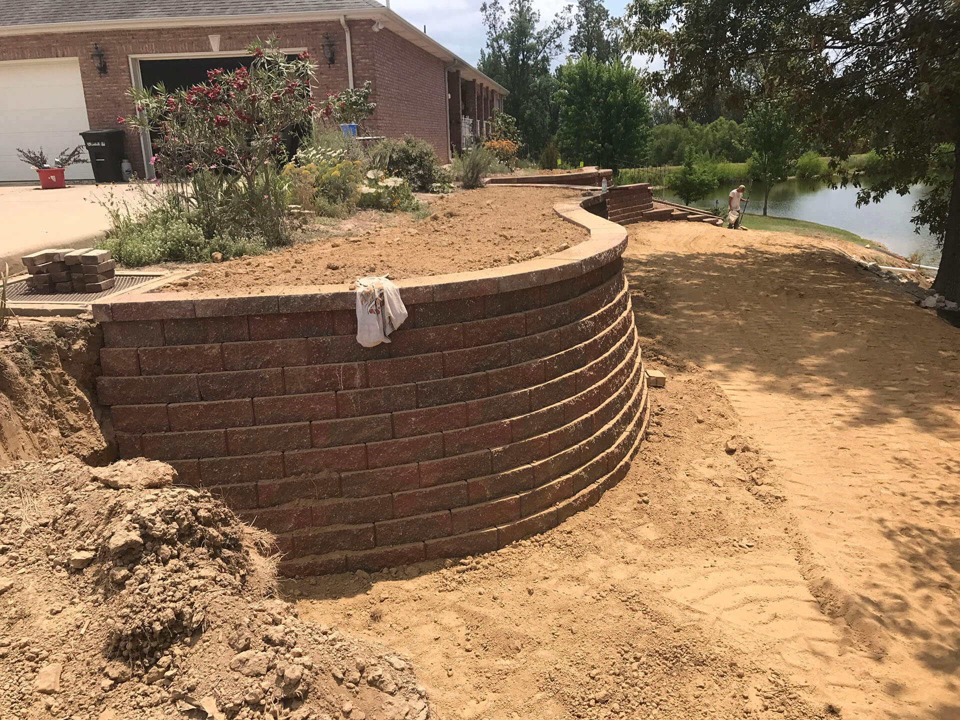 leveling a yard and building a retaining wall Dexter, MO Project
