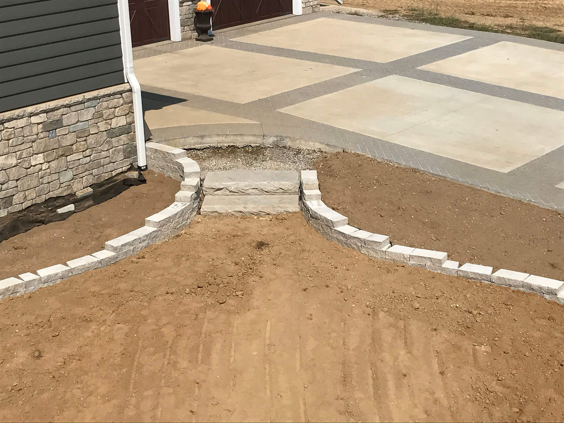 retaining walls with integrated stone steps Dexter, MO Project