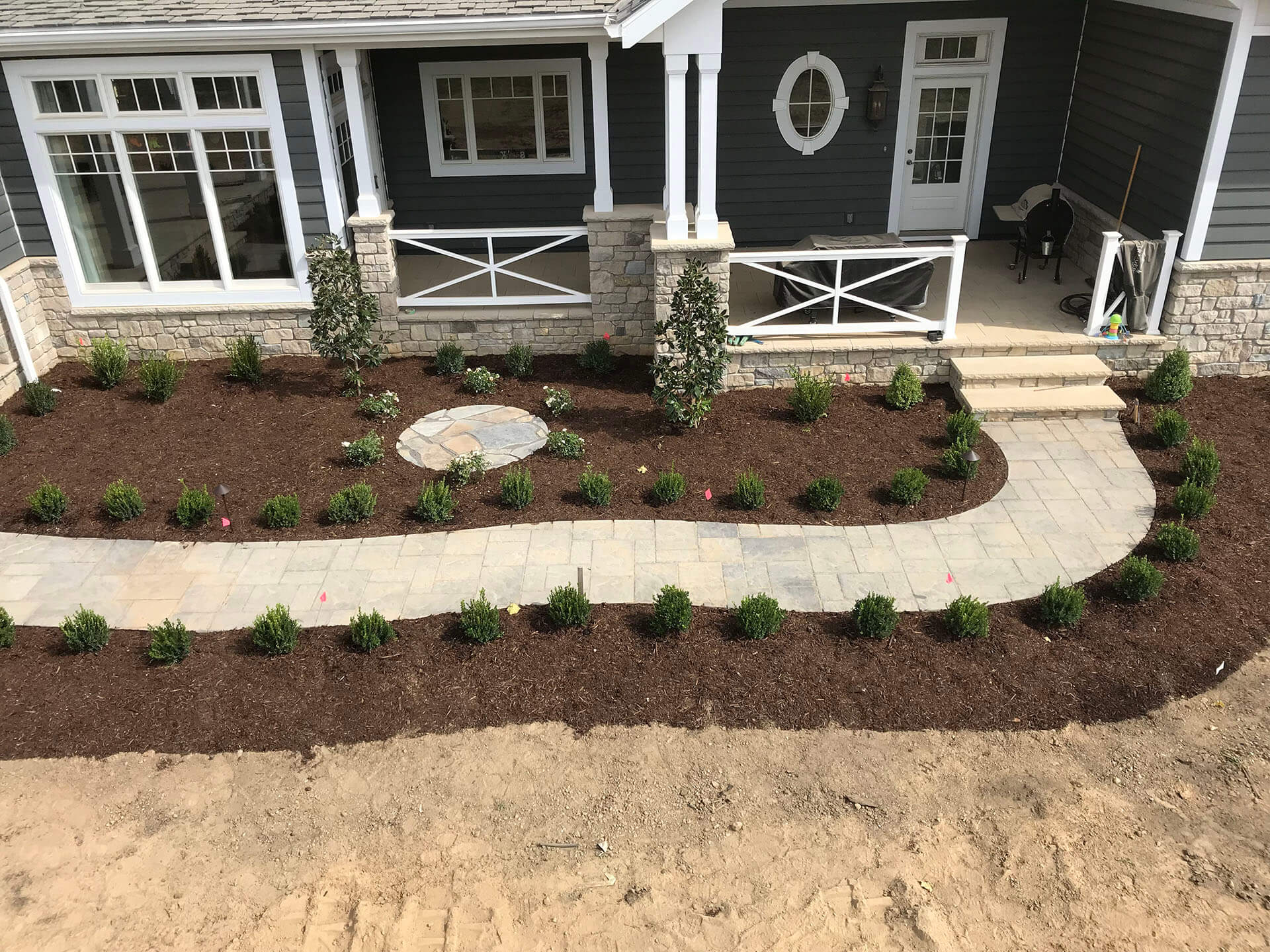 light colored natural stone walkway, porch Dexter, MO Project