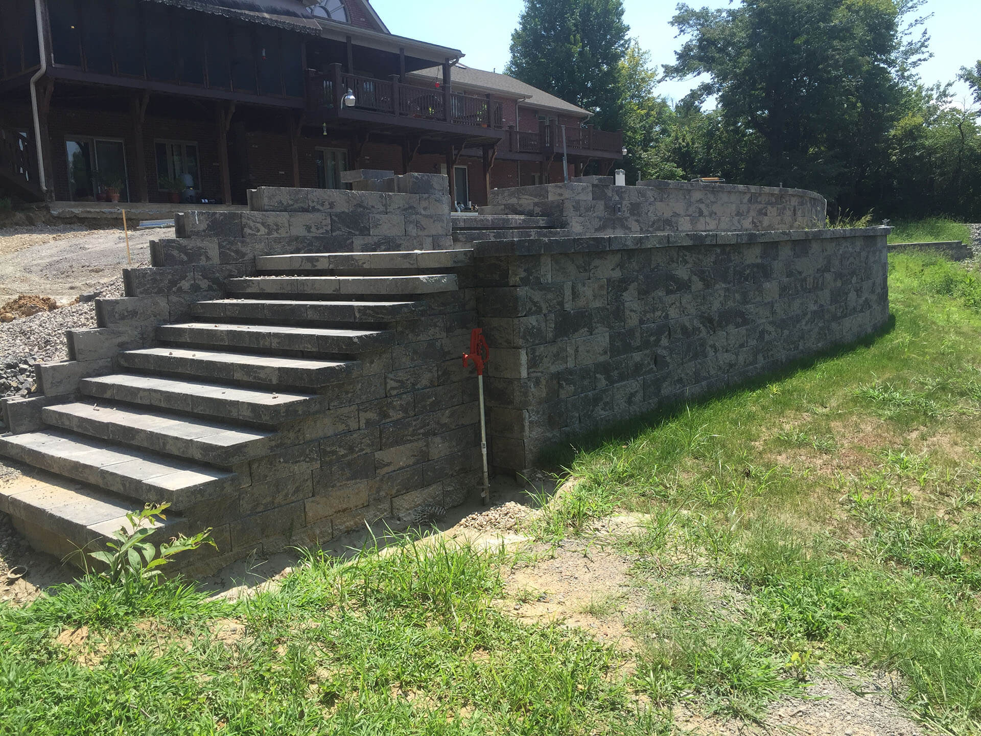 waterfront yard leveled with stone retaining walls Cape Girardeau, MO Project