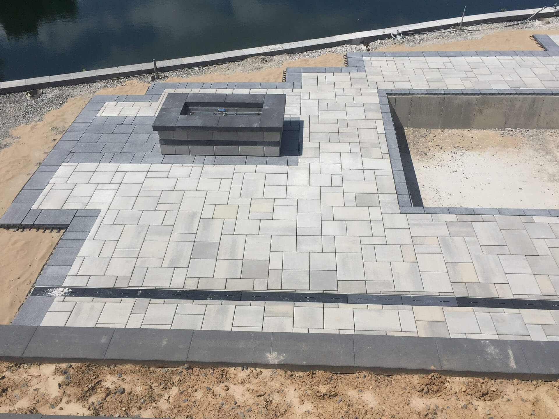grey and white stone pool deck and patio Cape Girardeau, MO Project