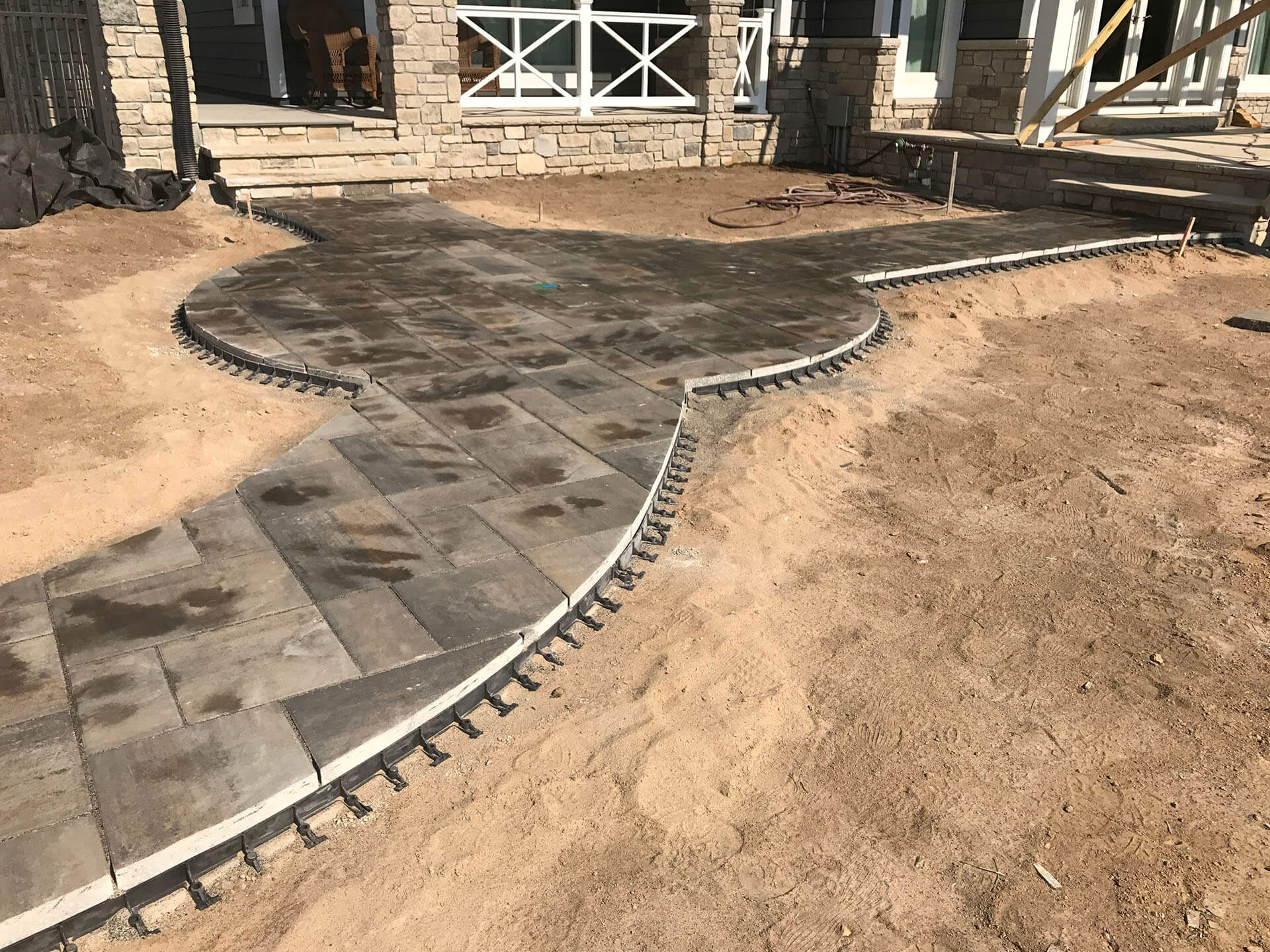 natural stone walkways under construction Dexter, MO Project