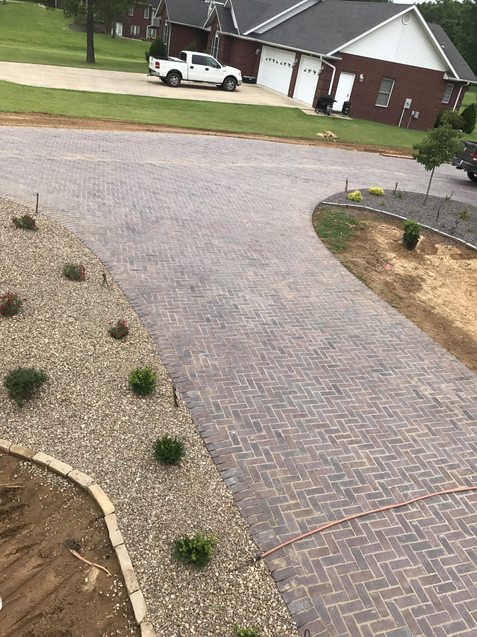 stone driveway and landscape features for a home in Poplar Bluff, MO