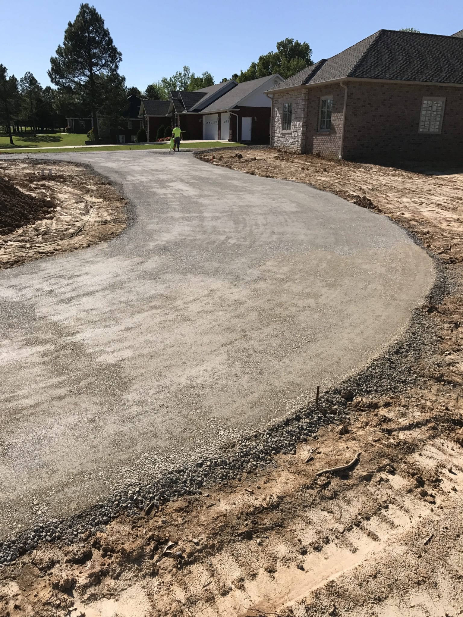 preparing the ground surface for a stone driveway for a home in Poplar Bluff, MO